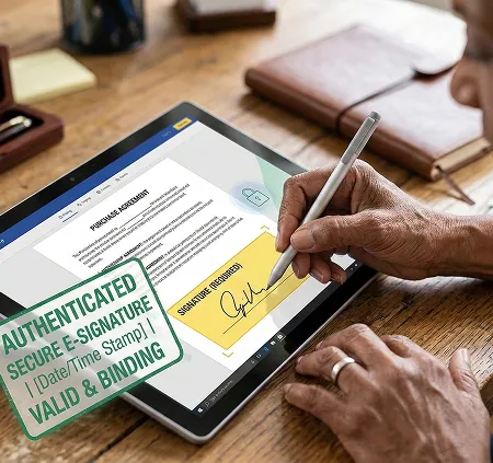 Purchase agreement being signed on a tablet and stamped as an authenticated, binding e-signature